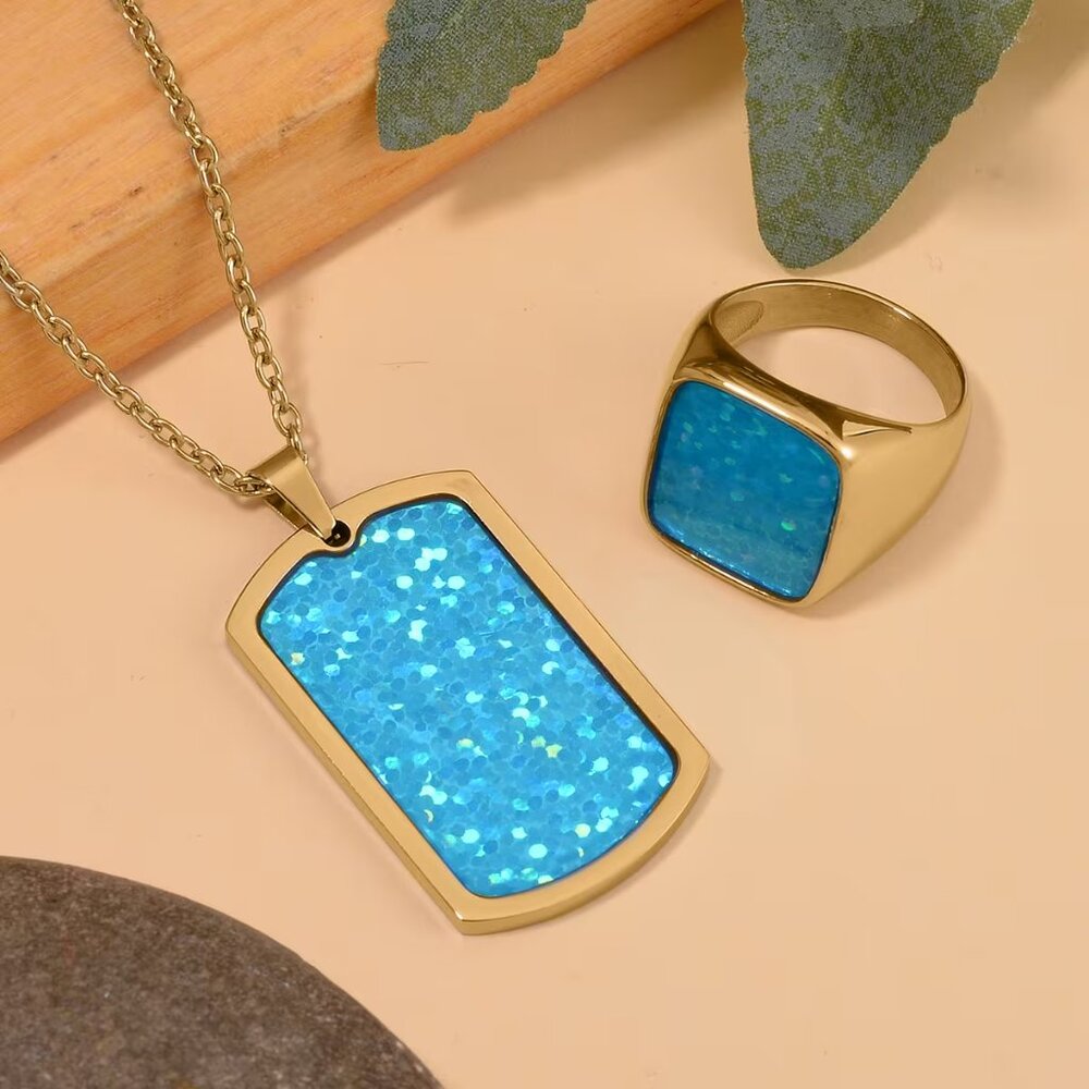 A Turquoise Color Enameled Ring Size 11 and Pendant Necklace Set
